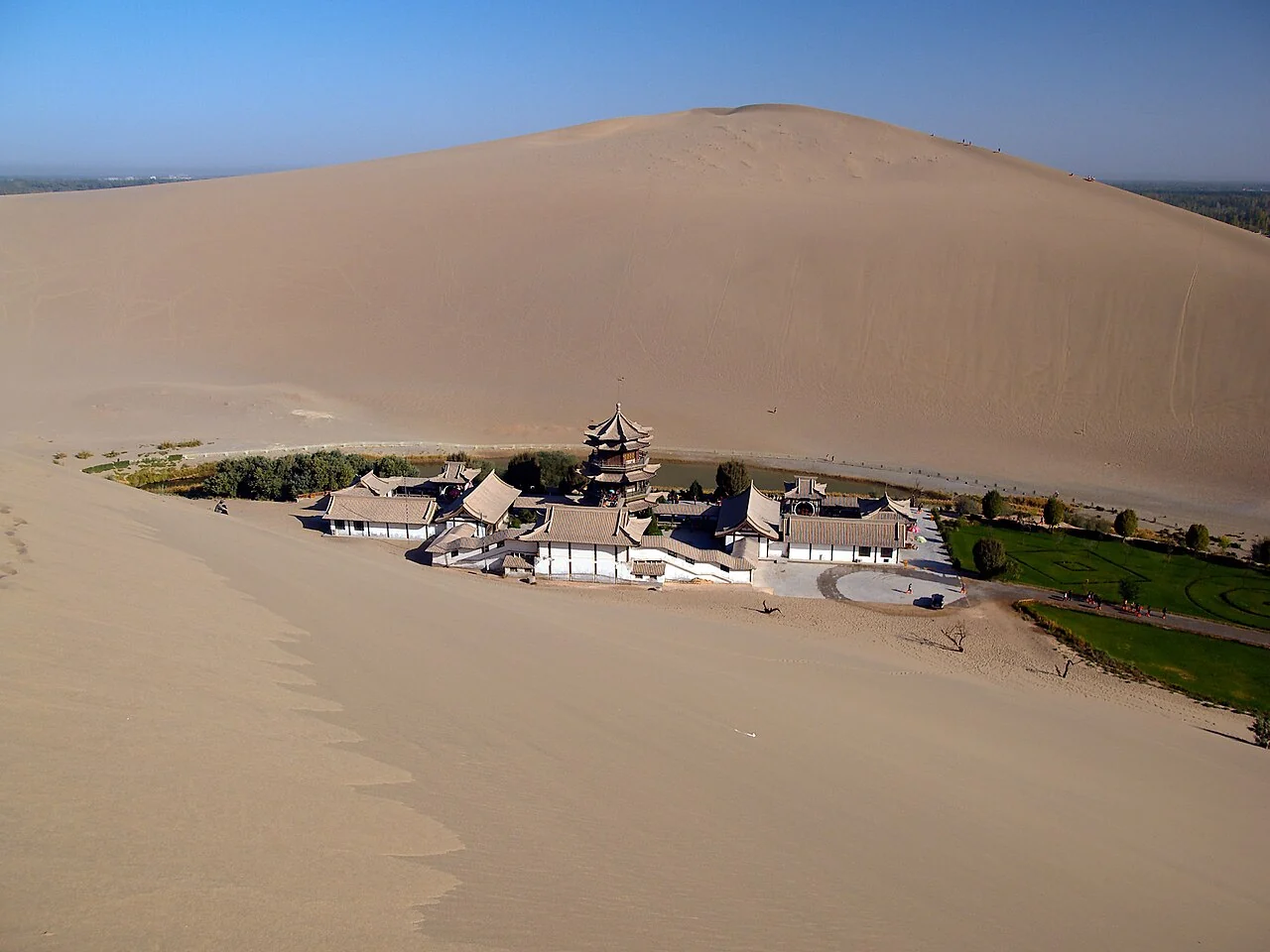 Mogao Caves exterior, Dunhuang. Credited destination photography; an illustration of the site.