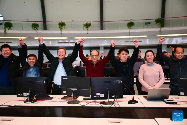 Members of the EAST research team following a successful fusion experiment.