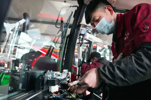 Installing a BeiDou-equipped tractor terminal in Jiamusi, 12 March 2024.