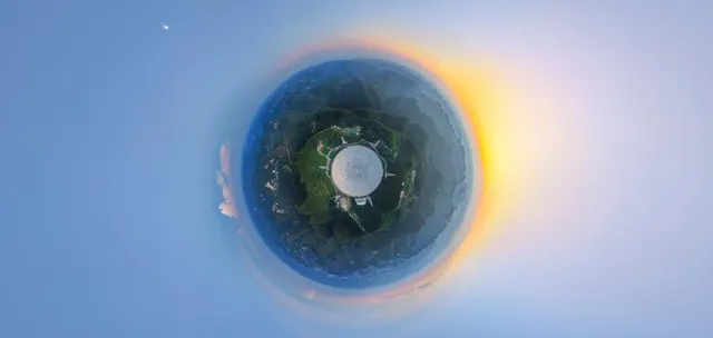 FAST at sunset, 22 September 2026; panoramic aerial view.