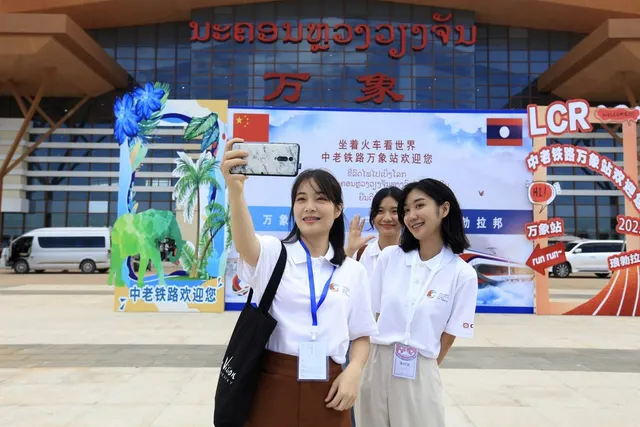 Young travellers before boarding in Vientiane, 21 June 2023.