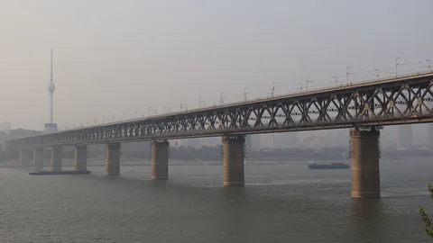 The steel spans of Wuhan Yangtze River Bridge across the river.