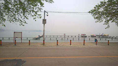 East Lake by Wuhan University’s Lingbo Gate on a hazy day.