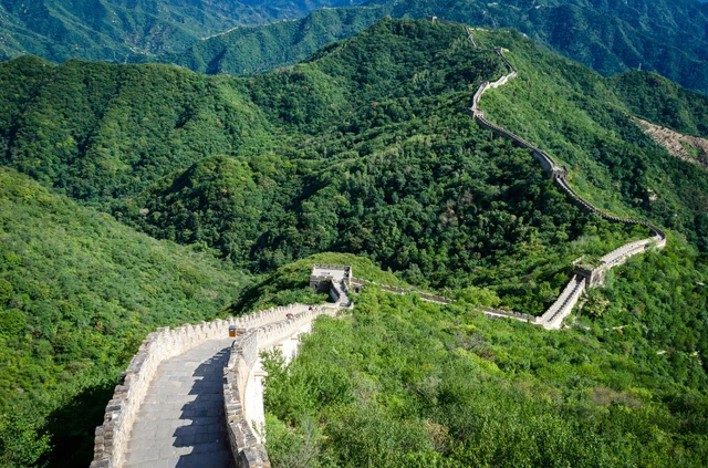 The Great Wall follows the wooded ridges at Mutianyu near Beijing.