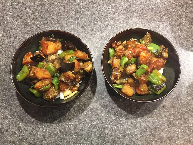 A di san xian preparation cooked in Dallas, Texas, in 2018; an outside-Changchun example identified by its source.