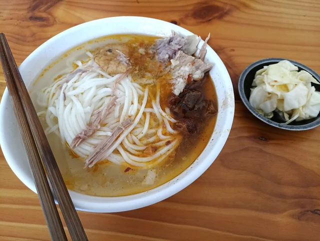 Weishan pork ersi rice noodles in a bowl.