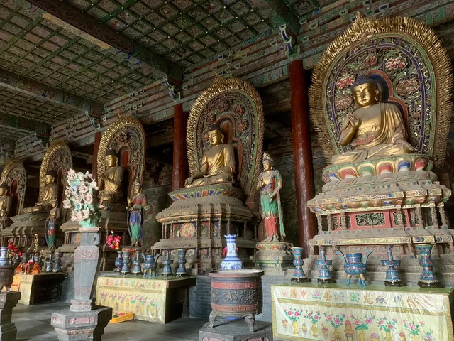Buddhist statues inside the main hall of Huayan Temple in Datong.