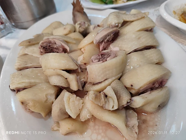 White-cut Wenchang chicken at a Sai Ying Pun restaurant in Hong Kong, photographed in January 2026; an overseas preparation example.