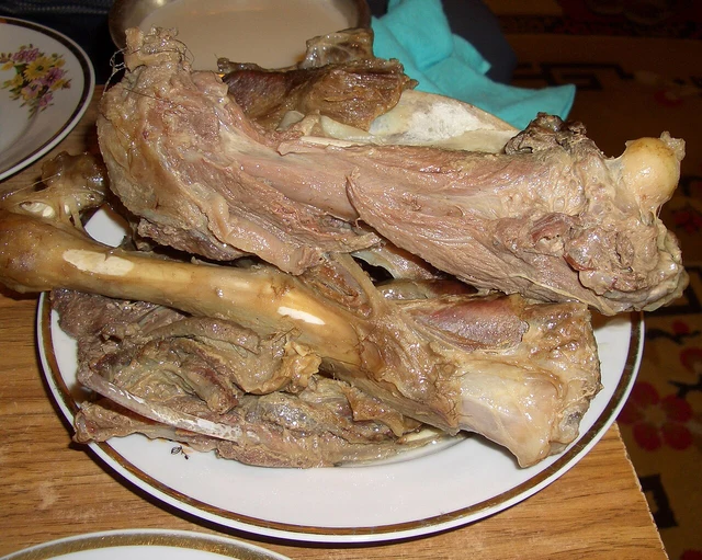 An example of Mongolian boiled meat with bones; the source does not specify the city or meat species.