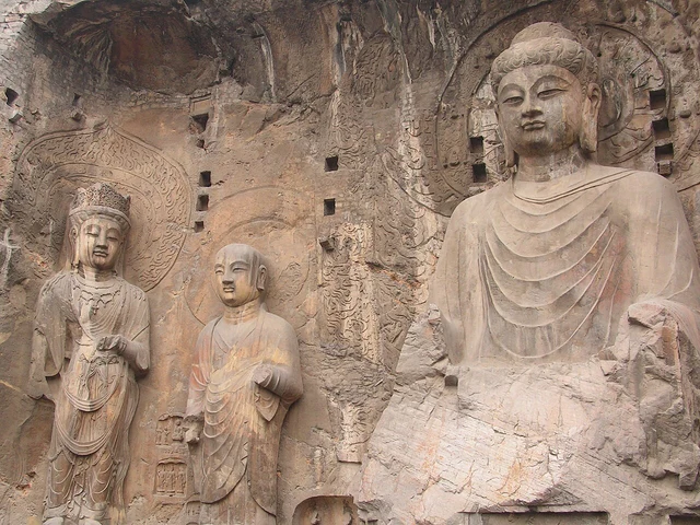 Stone-carved figures at Longmen’s Fengxian Temple.