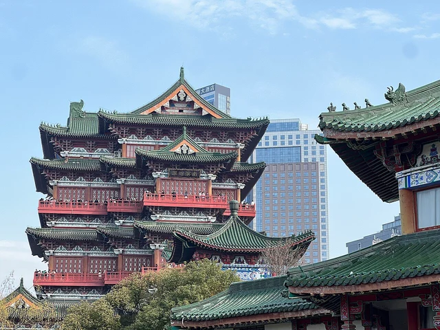 Architecture and roofs in Nanchang’s Tengwang Pavilion tourism complex photographed in February 2023; not surviving Tang fabric or a current weather view.
