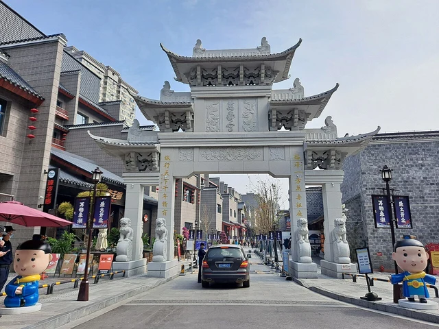 Wanshougong historic district in Nanchang; distinguish repaired fabric, reconstructions and contemporary shopfronts.