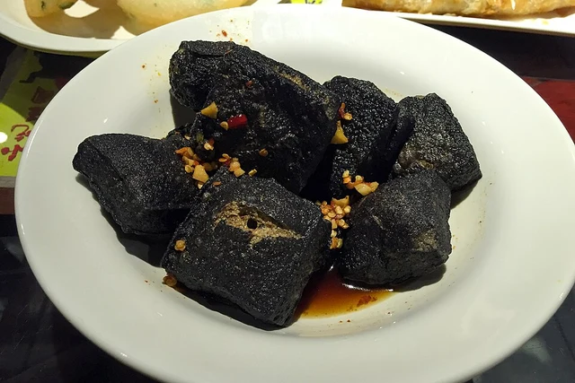 Black Changsha-style stinky tofu with chilli sauce at Huogongdian.