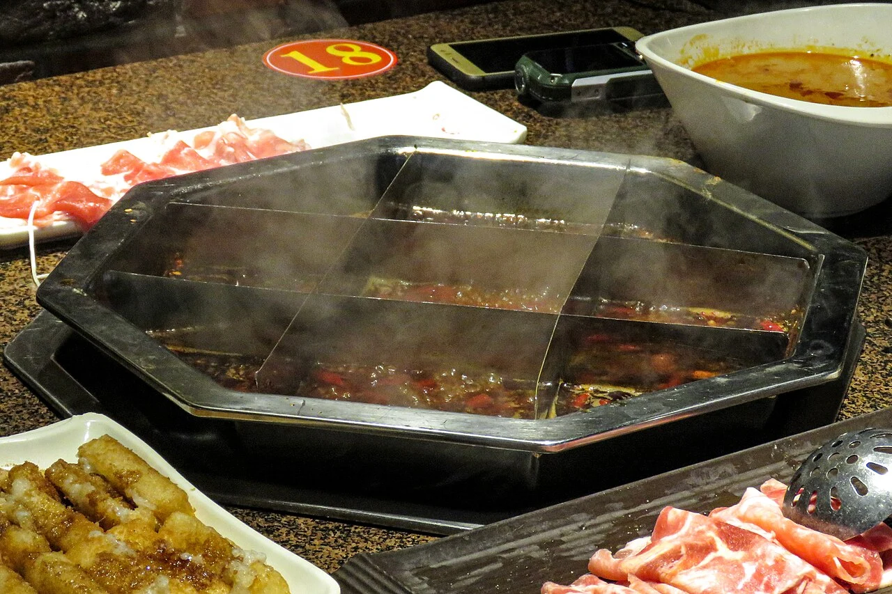 A nine-compartment hotpot with different broths in a Chongqing restaurant in February 2018.