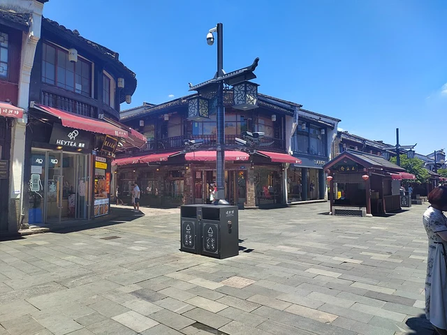 Historic-style shops and a paved street on Hefang Street, Hangzhou, in July 2024.