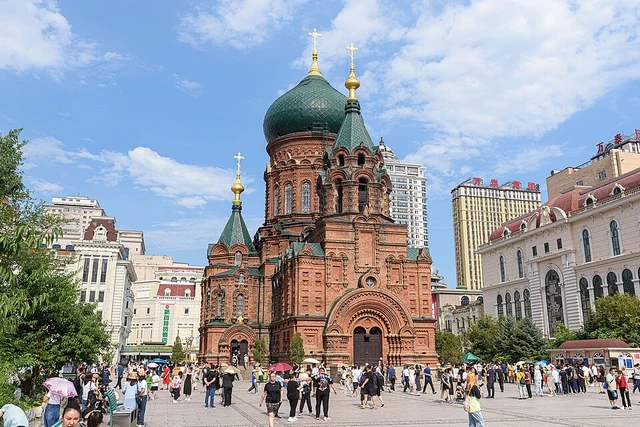 The west entrance and green onion dome of Harbin's St. Sophia Cathedral in July 2023.