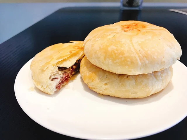Yunnan rose flower cakes, one opened to show the rose filling.