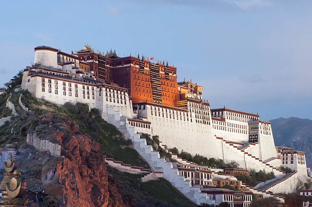 The red and white buildings of Potala Palace on the hillside in Lhasa.