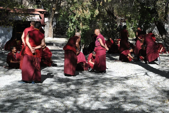 Monks practising debate in a courtyard at Sera Monastery in 2013.