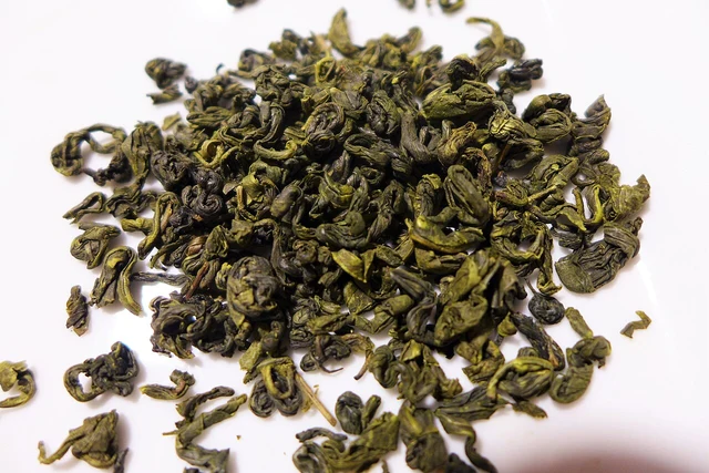 Rolled green leaves of Suzhou Biluochun tea.