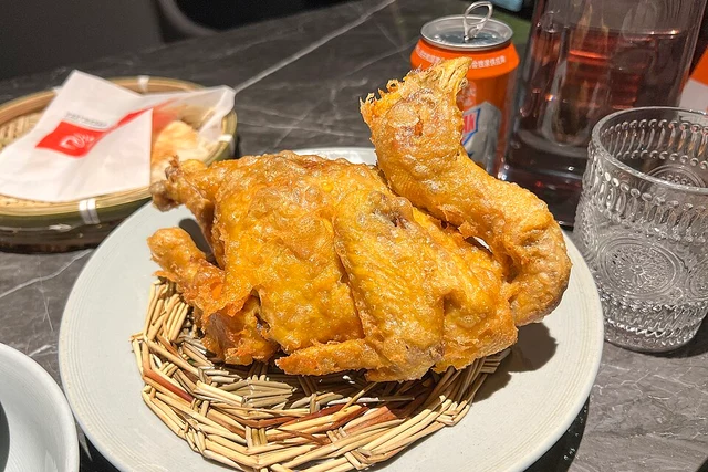 Shaanxi-style huluji, a fried whole chicken, at a Beijing restaurant in June 2024.