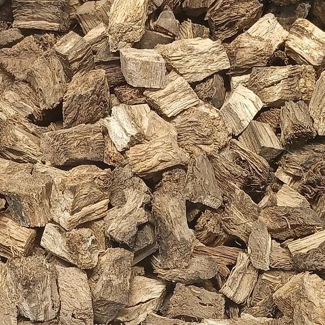 Dried gray kudzu-root blocks shown in close view.