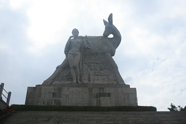 The Deer-Looking-Back sculpture in Sanya’s Luhuitou area; a historical photograph.