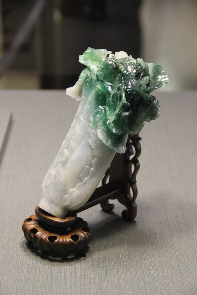 The National Palace Museum’s Jadeite Cabbage, photographed in a historic gallery display; current exhibition location varies.