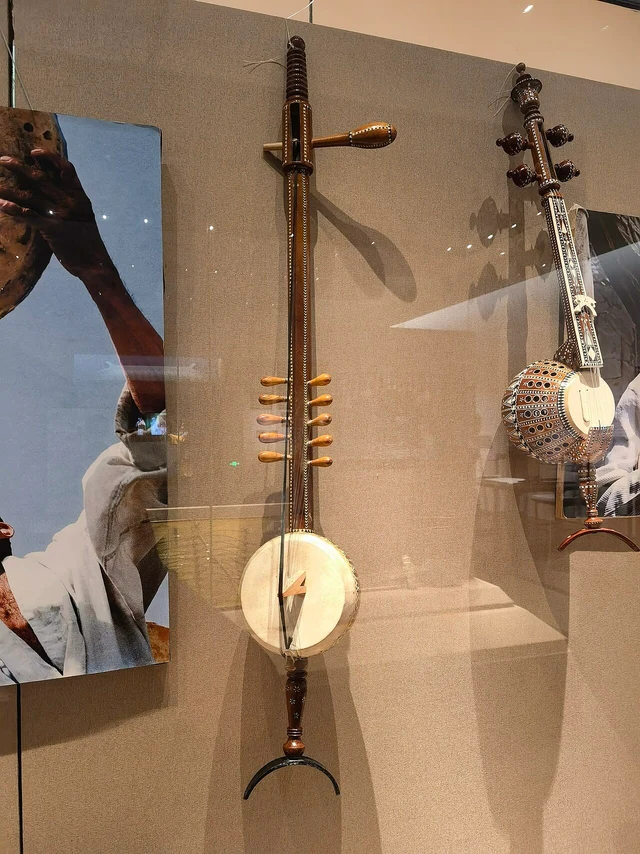 Two aijiek string instruments displayed at Urumqi Museum.