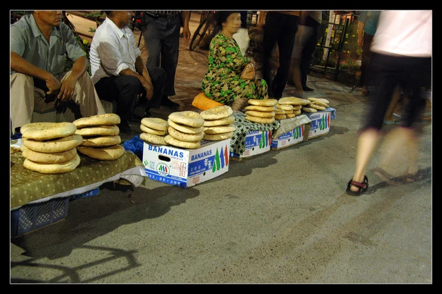 Xinjiang naan bread photographed at a night market in Shanshan, as a dish example.