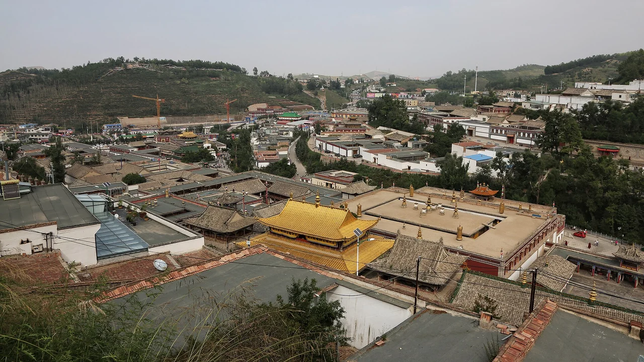 Temple roofs and hills at Kumbum Monastery in Qinghai