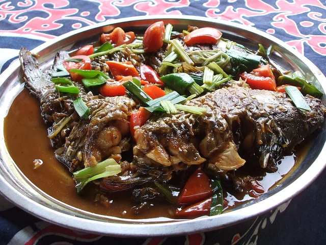 A prepared beer-fish dish photographed in Yangshuo.