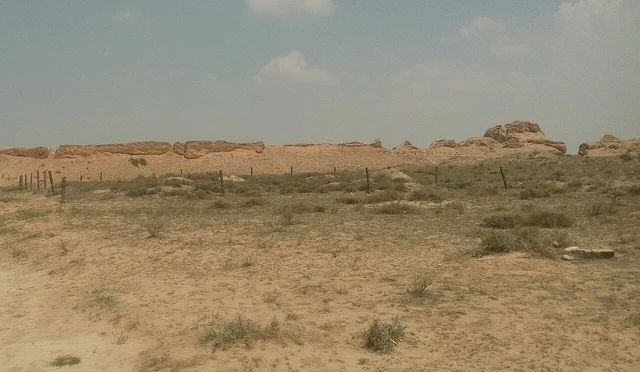 Shuidonggou site landscape with the Ming Great Wall in the distance; distinguish Palaeolithic and Ming periods.