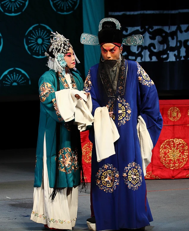 Costumed Yuju performers; the source does not specify the photograph’s venue or date, and it is not a current Zhengzhou programme.