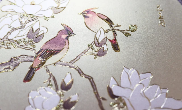 A floral-and-bird gold-leaf-decorated artwork at Nanjing Gold Thread and Gold Leaf Factory.
