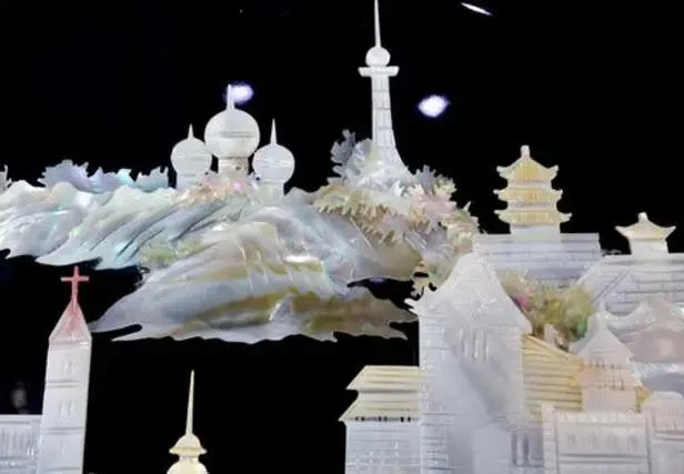 Shell carving depicting Qingdao landmarks, in Shandong’s 2022 official craft feature.